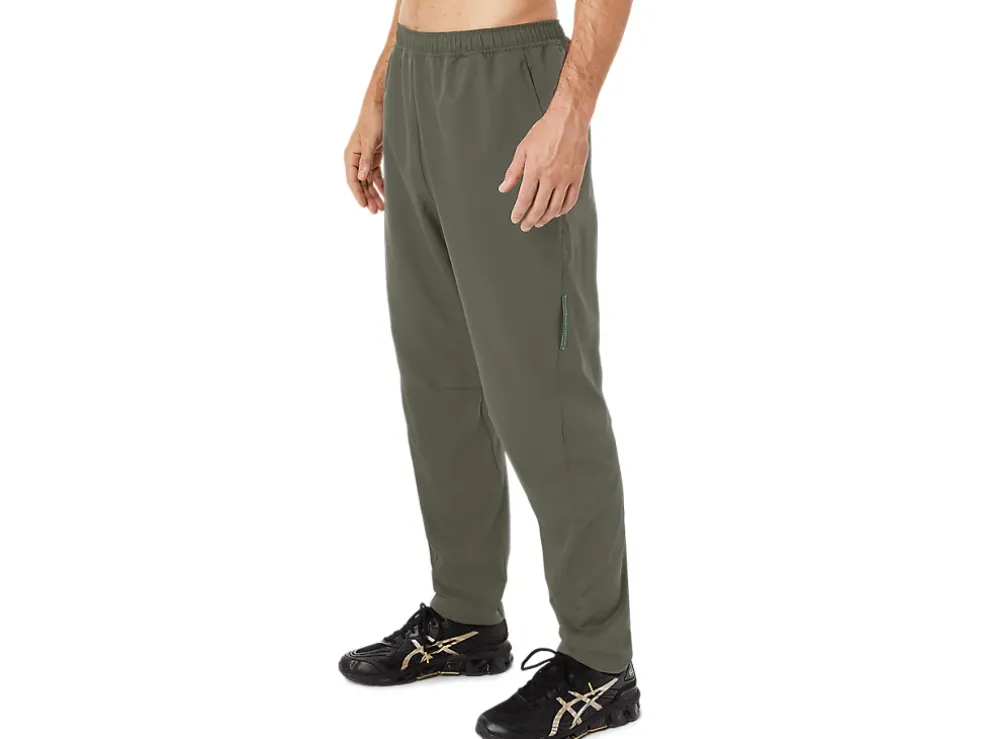 Store ASICS MEN WOVEN PANTS Mantle Green